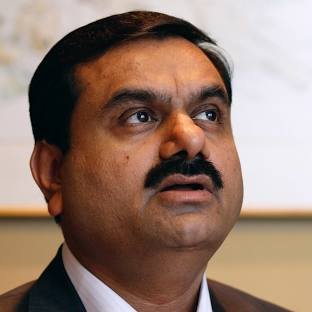 Gautam Adani, chairman of Adani Enterprises Ltd., speaks during an interview in Mumbai, India, on Tuesday, May 31, 2011. Adani Enterprises Ltd., India's biggest coal importer, may sell shares in a unit that produces the fuel to international investors and use the proceeds to add energy assets. Photographer: Adeel Halim/Bloomberg via Getty Images